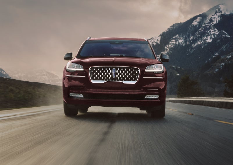 A 2024 Lincoln Aviator® SUV is shown in the Diamond Red exterior color. | Johnson Sewell Lincoln in Marble Falls TX